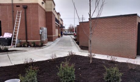 Kansas City street sweeping after picture of construction track out