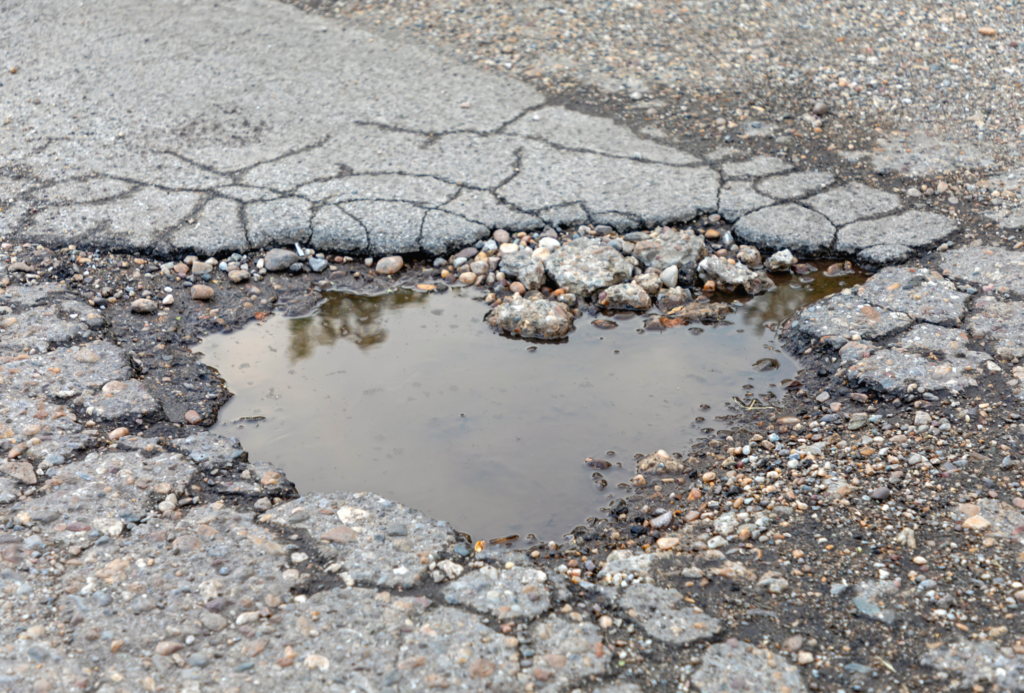 parking lot maintenance to help prevent pot holes