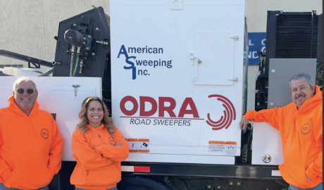 Gale Holsman, Shannon lock and Robert of American Sweeping on front cover of North American Sweeper Magazine